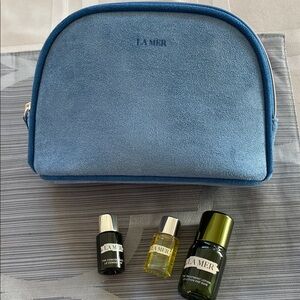 La Mer Blue Suede Bag with Skincare Deluxe Travel Trio